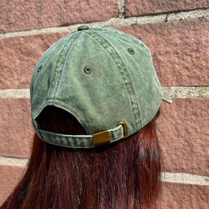 Vintage Cap in grün mit Metallverschluss von hinten