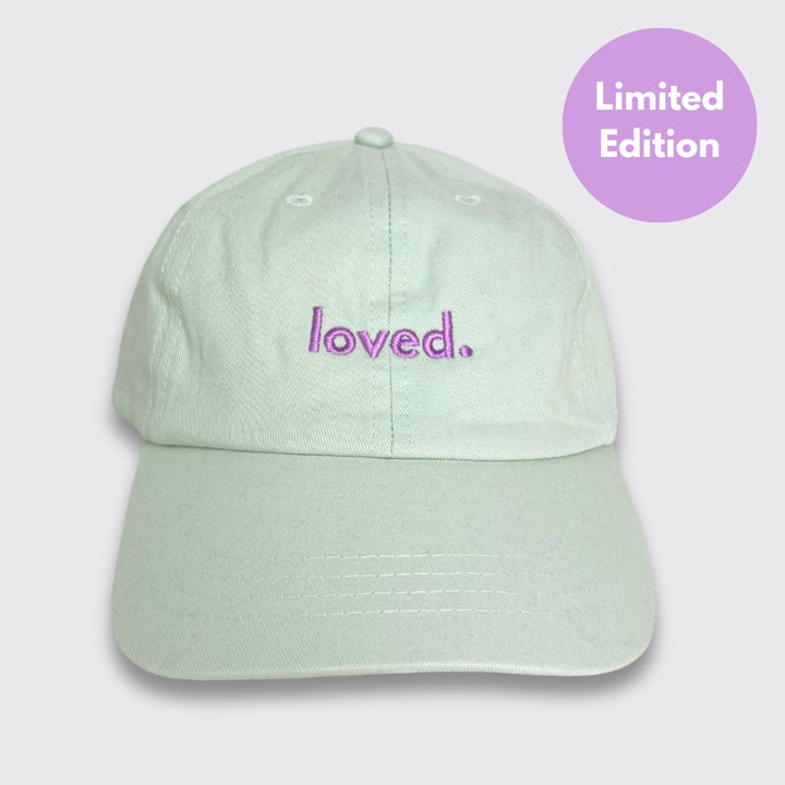 Cap "loved." Stick