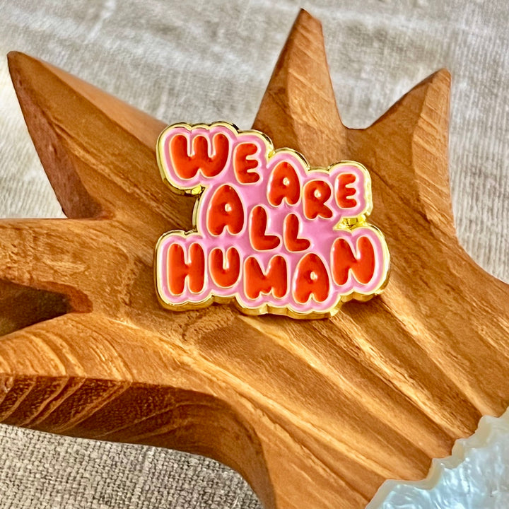 Anstecknadel "We are all Human"
